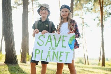 children-are-holding-poster-save-planet-earth-day-let-s-save-planet-from-pollution_255667-33609.jpg